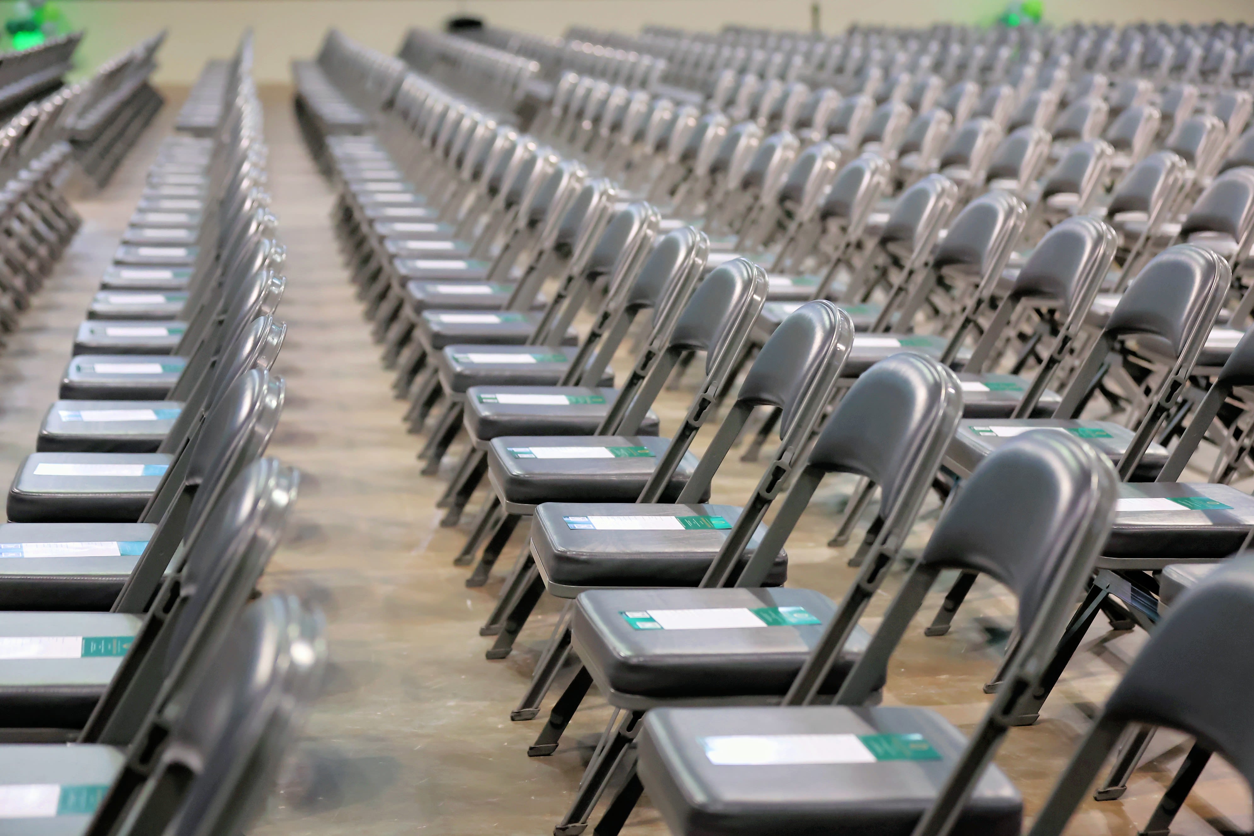 Diverse graduates in caps and gowns during a joyous graduation ceremony, celebrating achievement and success.
