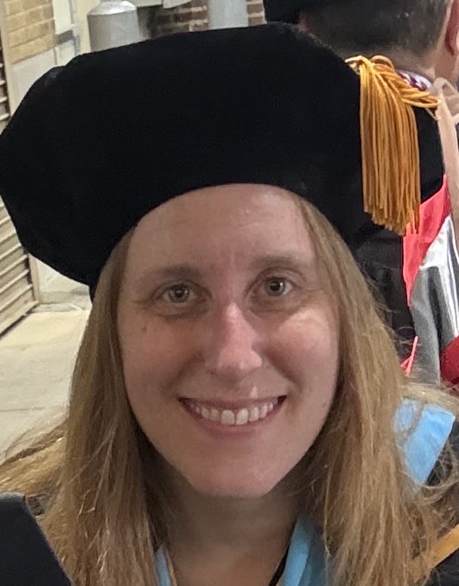 Diverse graduates in caps and gowns during a joyous graduation ceremony, celebrating achievement and success.