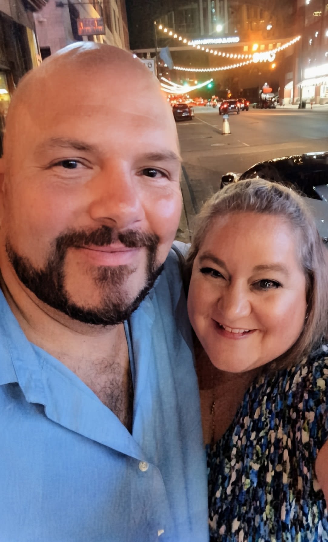 a couple of men standing next to each other